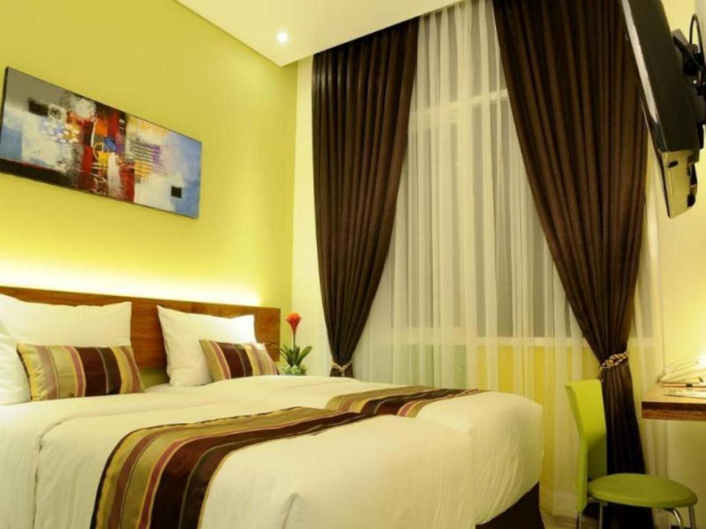 Biz Boulevard Hotel Манадо Экстерьер фото
